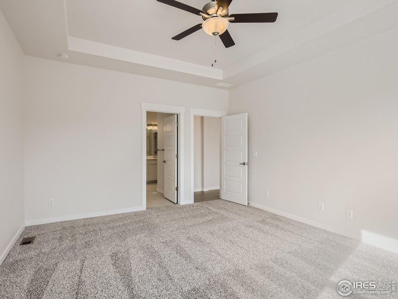 Spacious, unfurnished interior of a new home in RainDance, Windsor (Image 21).