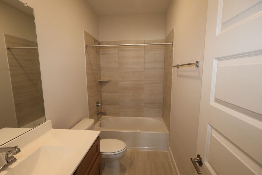 Furnished interior view inside a new home in Dunham Pointe, Cypress (Image 5).