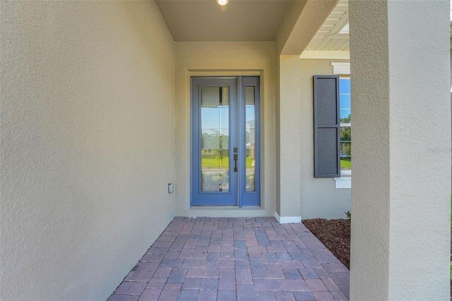 Exterior details and patio area of a home in Palms at Windermere, Windermere (Image 28).