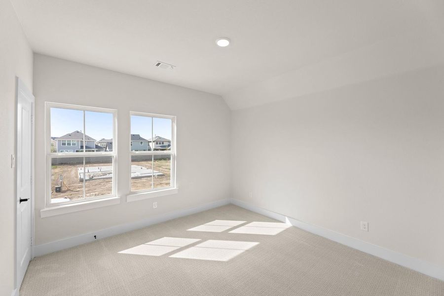 Spacious, unfurnished interior of a new home in Cottage Collection at Harvest, Argyle (Image 24).