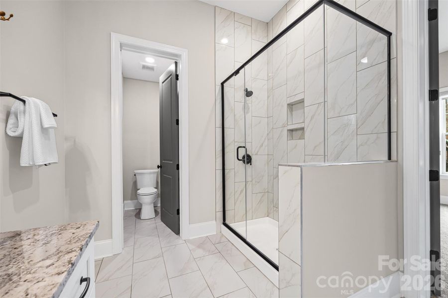 Furnished interior view inside a new home in , Charlotte (Image 39).