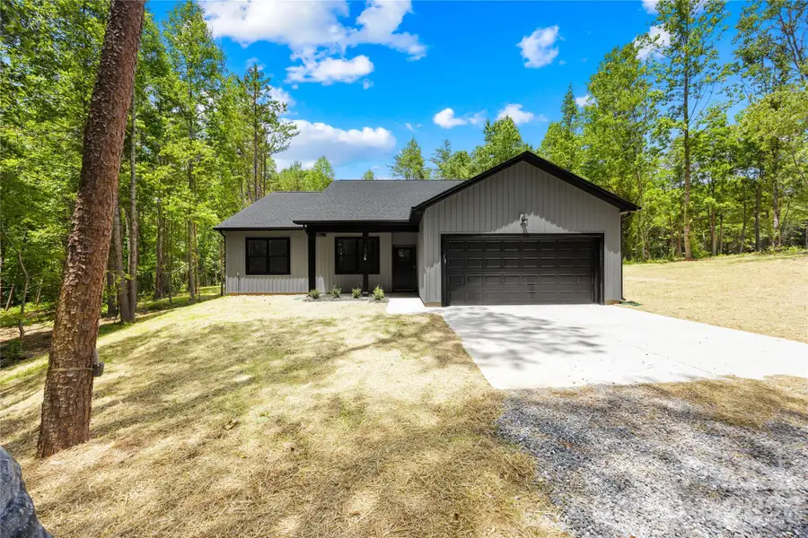 Front exterior of a new home in , Statesville, NC, highlighting curb appeal (Image 20).