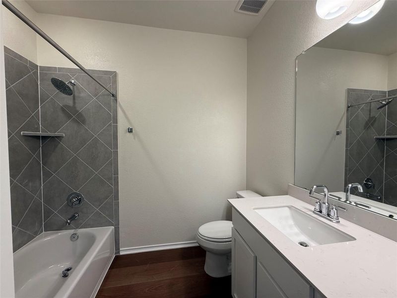 Furnished interior view inside a new home in River Bluff, Leander (Image 9).