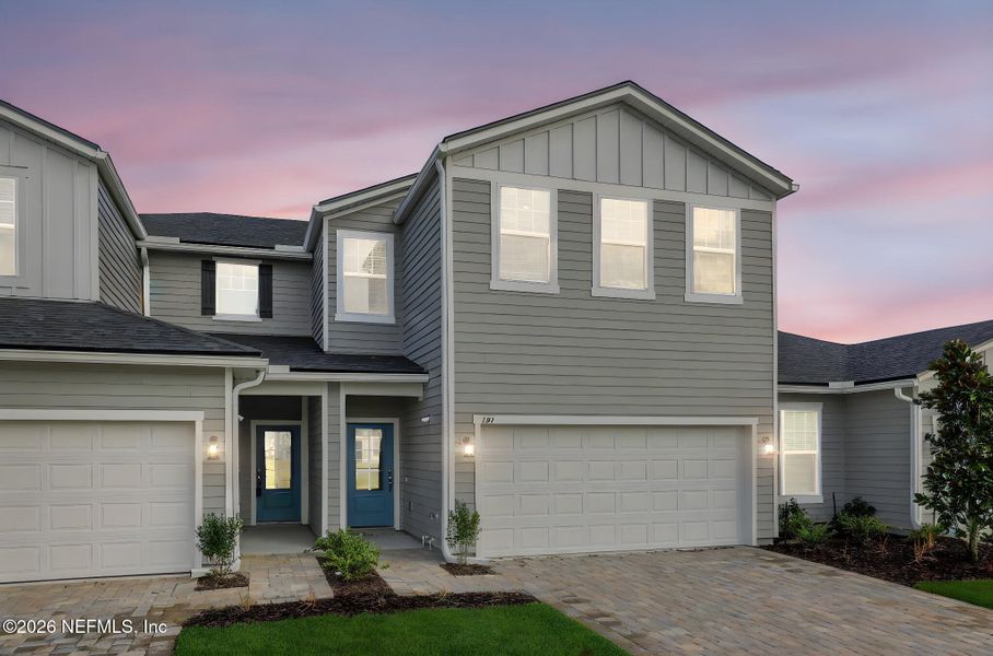 Front exterior of a new home in Cherry Elm at SilverLeaf, St. Augustine, FL, highlighting curb appeal (Image 23).