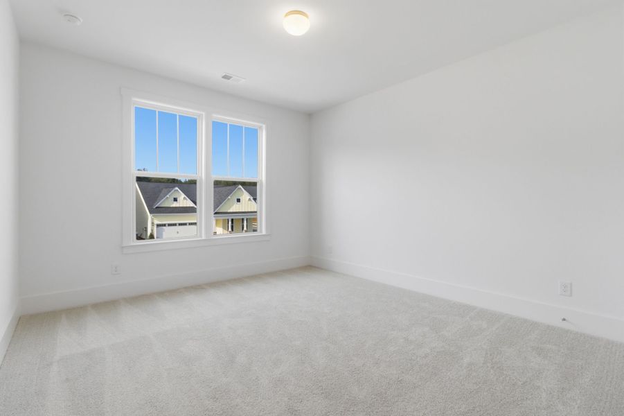 Spacious, unfurnished interior of a new home in Homecoming, Ravenel (Image 27).