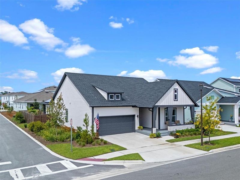 Front exterior of a new home in , St. Cloud, FL, highlighting curb appeal (Image 20).