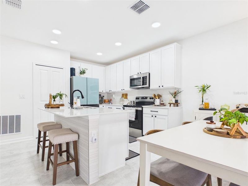 Furnished interior view inside a new home in Vineland Reserve, Osteen (Image 20).