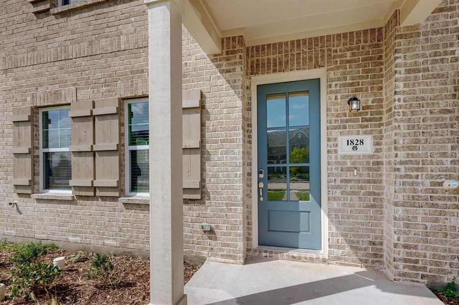 Exterior details and patio area of a home in Solterra Texas, Mesquite (Image 4).
