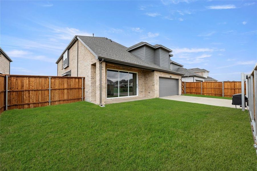 Front exterior of a new home in Villages of Creekwood, Frisco, TX, highlighting curb appeal (Image 2).