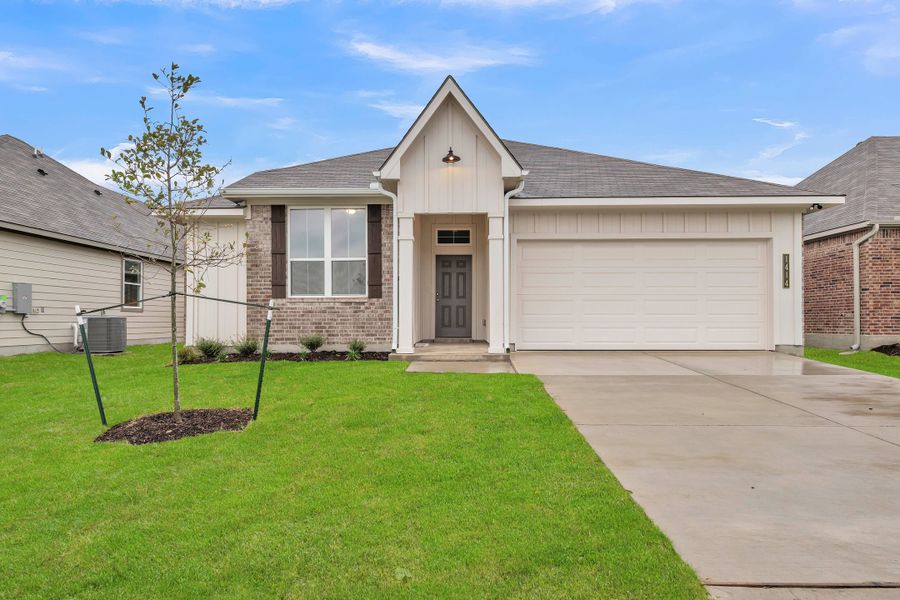 Front exterior of a new home in South Fork, Waco, TX, highlighting curb appeal (Image 1). Front exterior of a new home in South Fork, Waco, TX, highlighting curb appeal (Image 1).