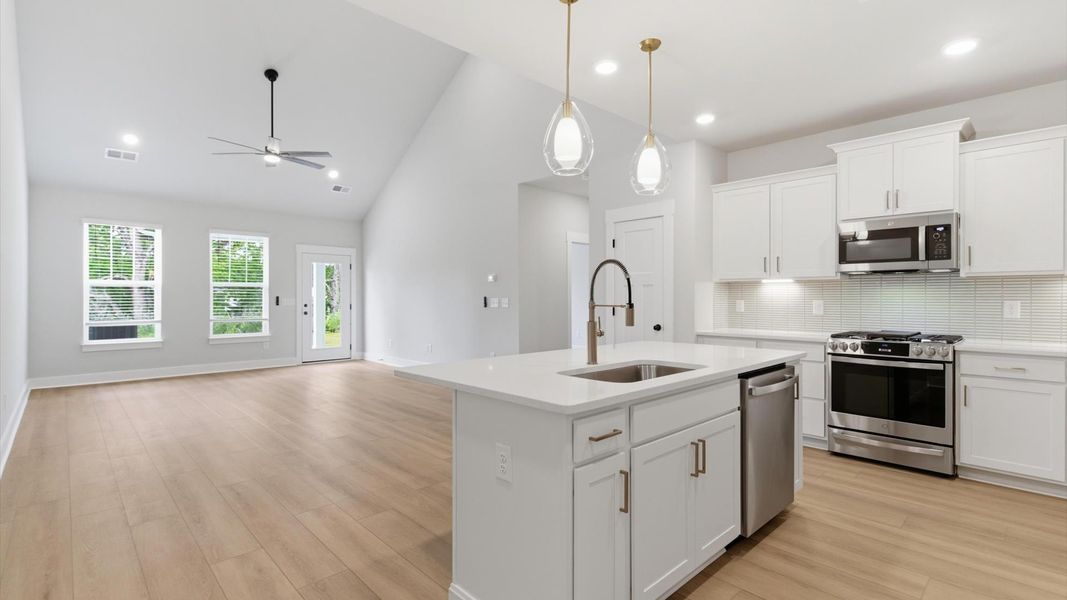 Furnished interior view inside a new home in Village at Midway, Anderson (Image 7).