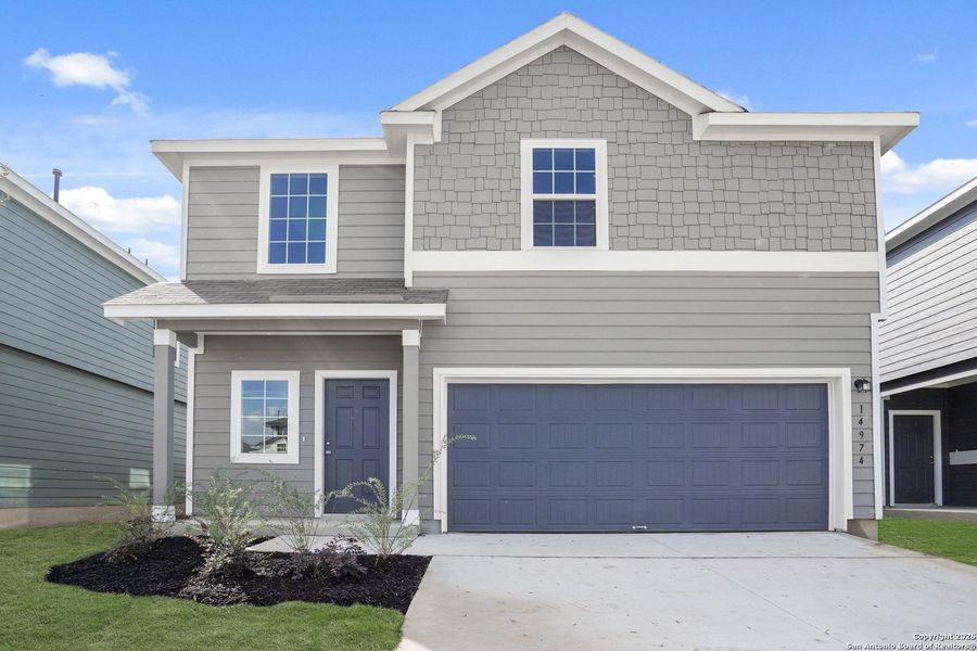 Front exterior of a new home in Timber Creek, San Antonio, TX, highlighting curb appeal (Image 25).