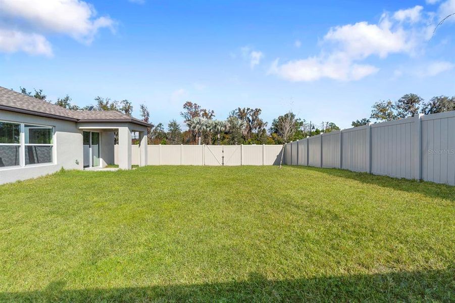 Exterior details and patio area of a home in North Park Isle: The Estates II, Plant City (Image 4). Exterior details and patio area of a home in North Park Isle: The Estates II, Plant City (Image 4).