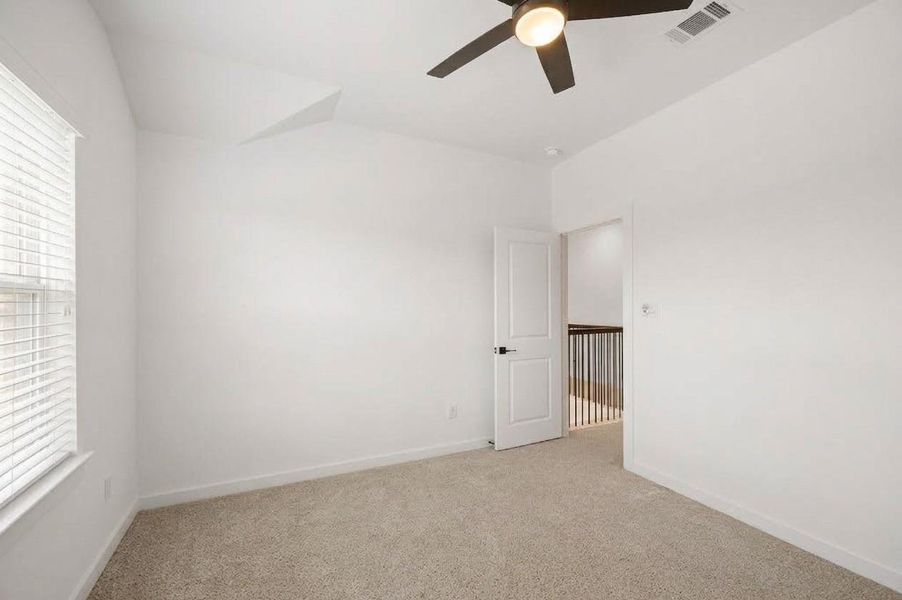 Spacious, unfurnished interior of a new home in Meridiana 40', 65', Iowa Colony (Image 24). Spacious, unfurnished interior of a new home in Meridiana 40', 65', Iowa Colony (Image 24).