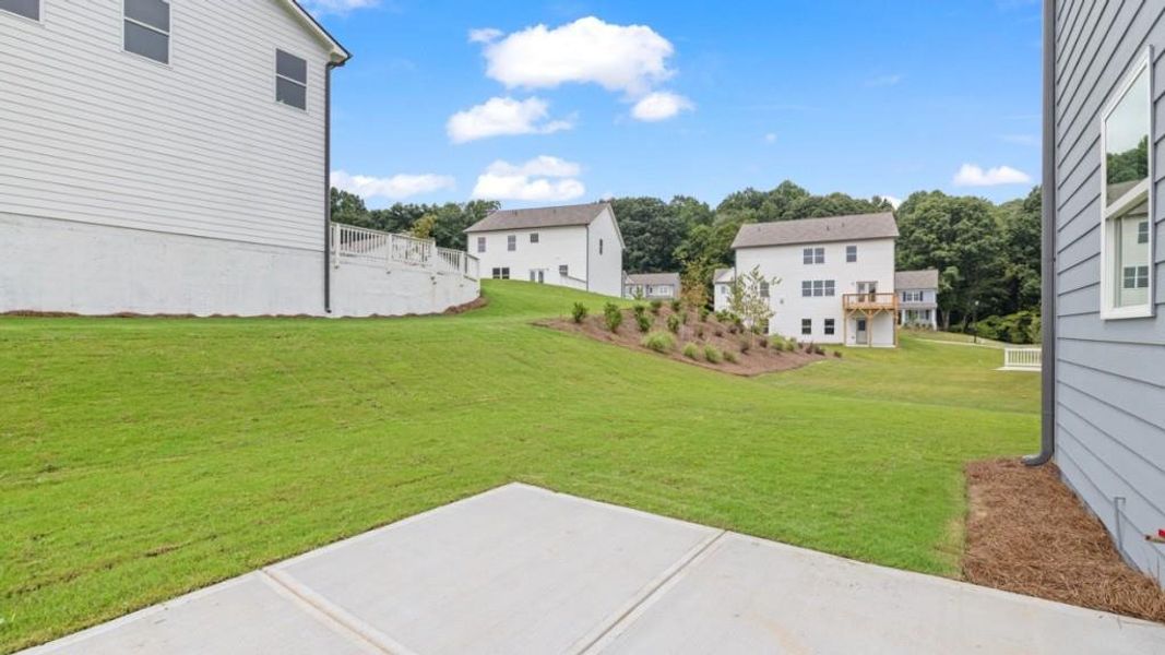 Exterior details and patio area of a home in Liberty Crossing, Braselton (Image 3).