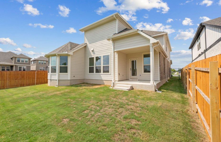 Exterior details and patio area of a home in Saddleback at Santa Rita Ranch, Liberty Hill (Image 23). Exterior details and patio area of a home in Saddleback at Santa Rita Ranch, Liberty Hill (Image 23).