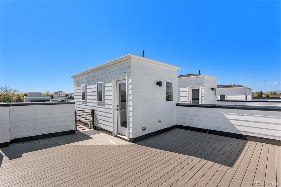 Exterior details and patio area of a home in Prelude at TAVA Waters, Denver (Image 2).