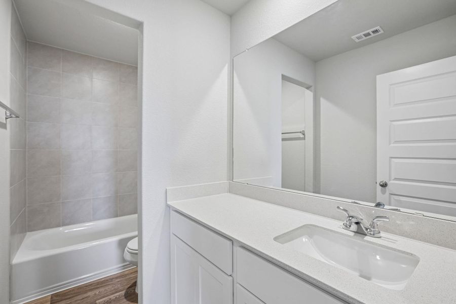 Furnished interior view inside a new home in Edgebrooke, Pflugerville (Image 10).