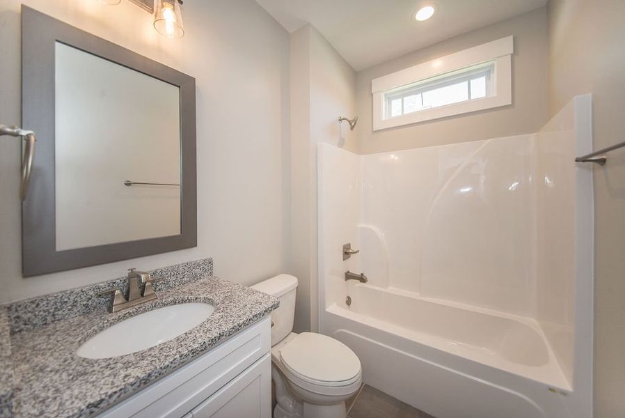 Representative furnished interior of a home built from the Beaumont Elite by Enchanted Homes in Pointe Summit, Slater-Marietta (Image 6).
