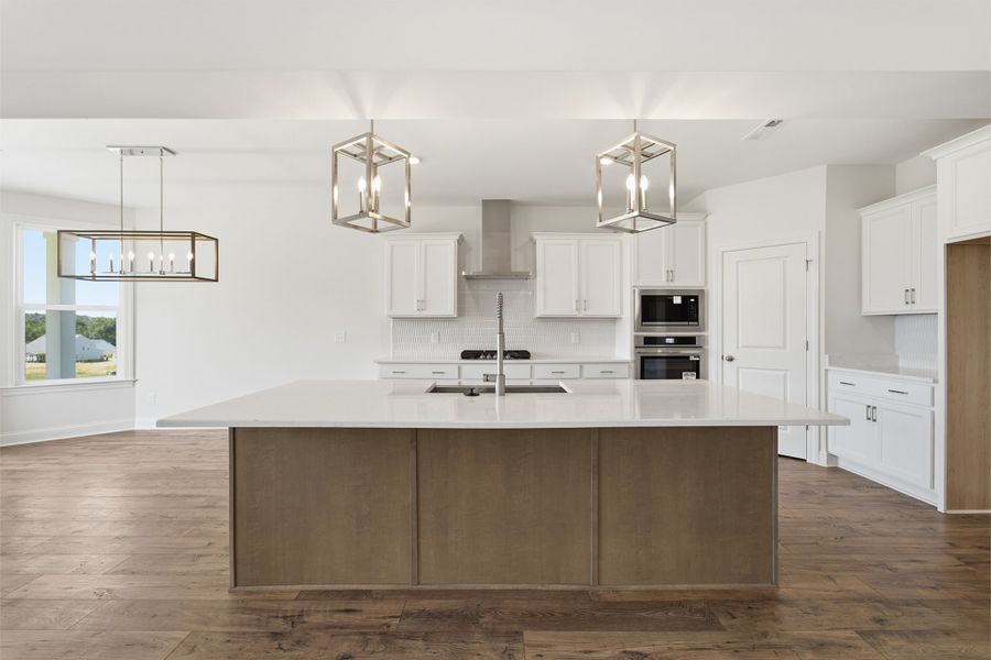 Furnished interior view inside a new home in Aden Woods, Fairview (Image 6).