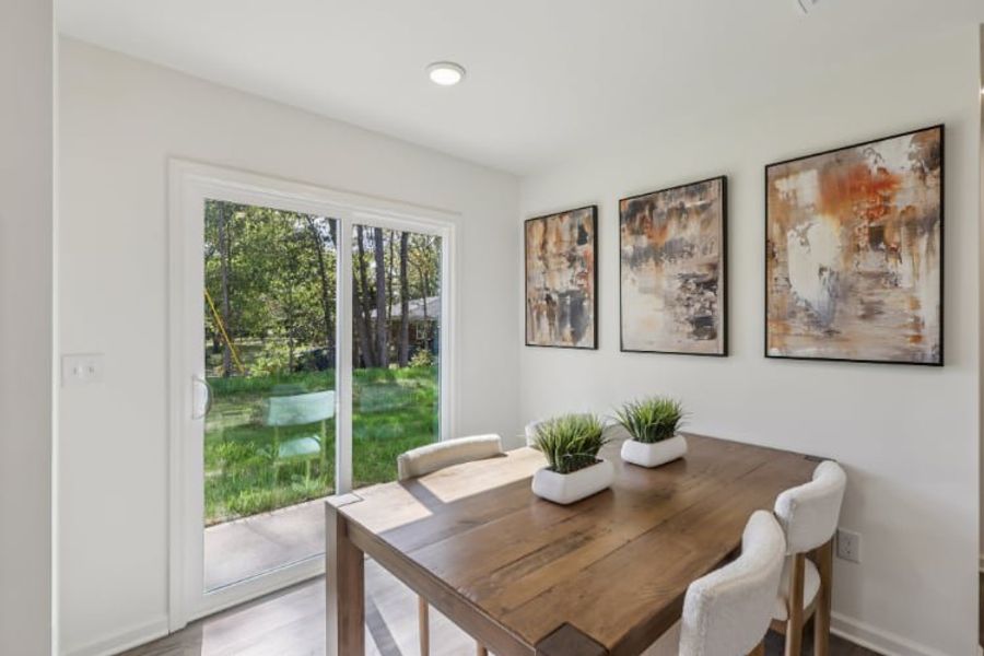 A table with a plant on it. A table with a plant on it.