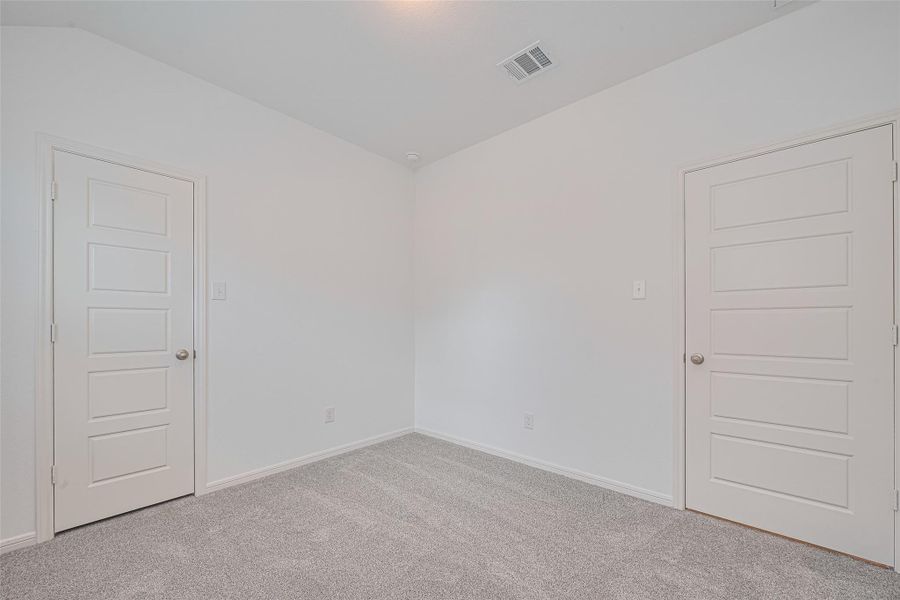 Spacious, unfurnished interior of a new home in Sunterra, Katy (Image 22).