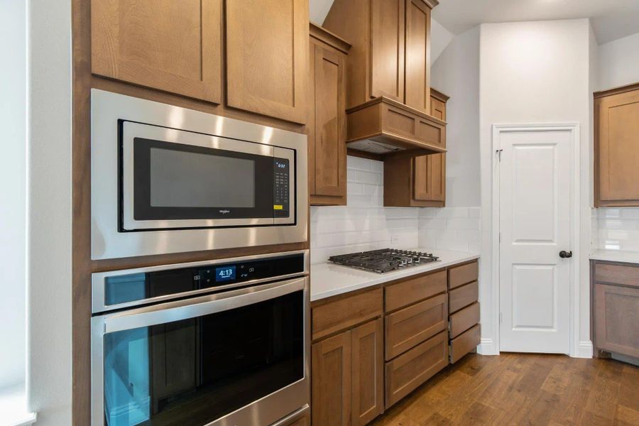 Kitchen | Concept 2086 at Redden Farms - Classic Series in Midlothian, TX by Landsea Homes