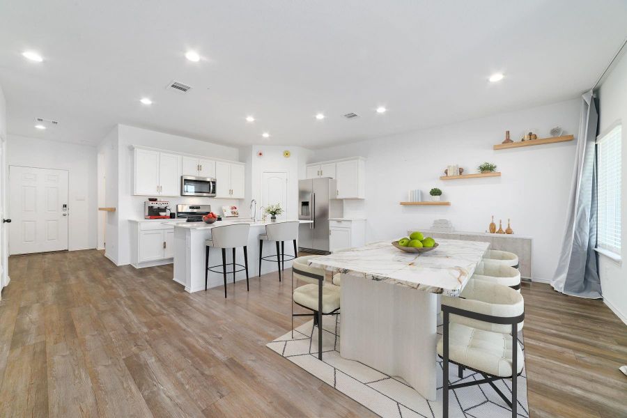 Furnished interior view inside a new home in Sunterra, Katy (Image 9).