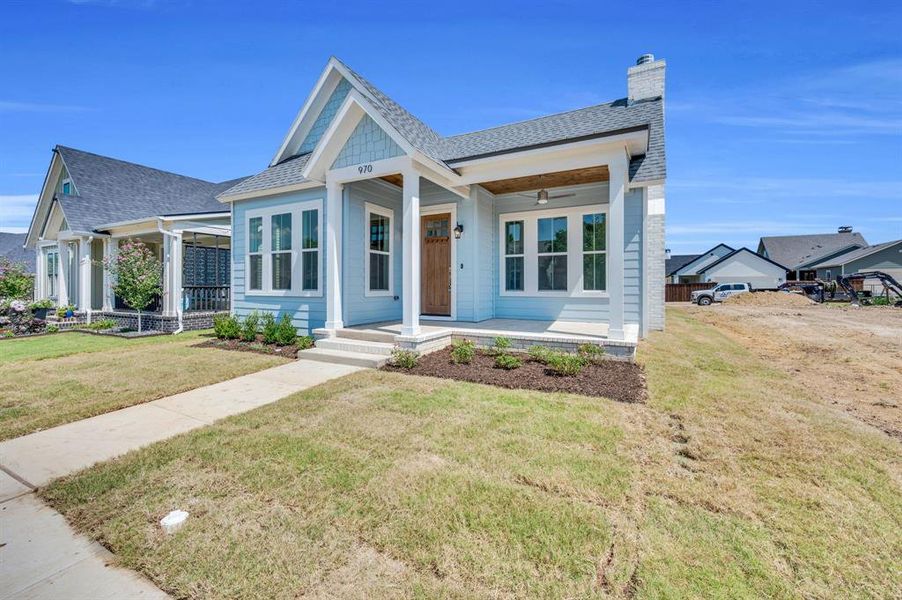 Front exterior of a new home in , Midlothian, TX, highlighting curb appeal (Image 19).