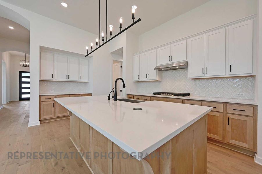 Furnished interior view inside a new home in Meridiana, Manvel (Image 4).