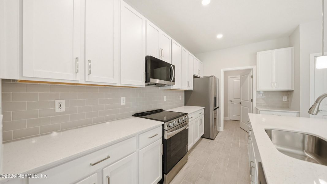Furnished interior view inside a new home in , Palm Coast (Image 12).