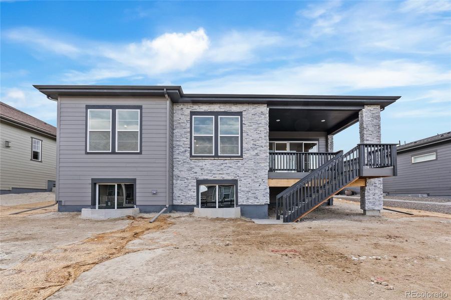 Exterior details and patio area of a home in Hilltop at Inspiration, Aurora (Image 21).