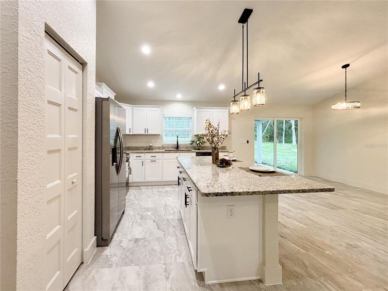 Furnished interior view inside a new home in , Dunnellon (Image 37).