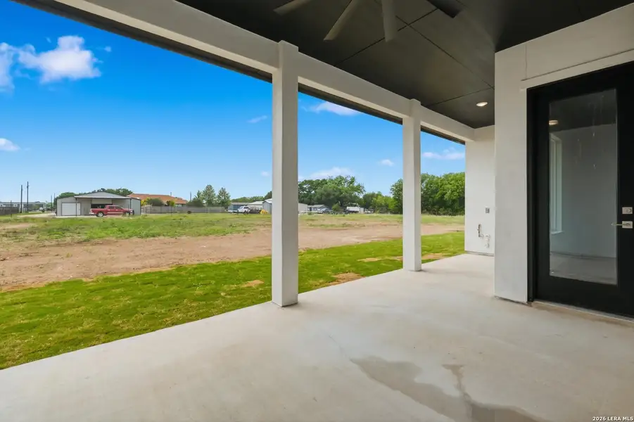 Exterior details and patio area of a home in , Castroville (Image 3).