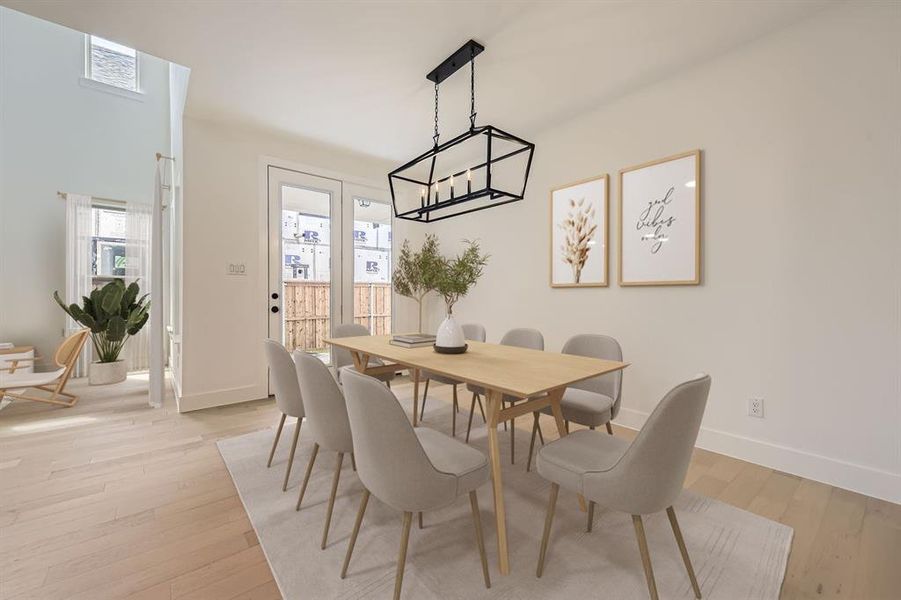 Virtually staged photo - Dining area with healthy amount of natural light and light wood finished floors Virtually staged photo - Dining area with healthy amount of natural light and light wood finished floors
