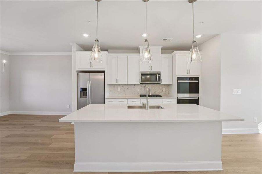 Furnished interior view inside a new home in Hemingway - Highland Series, Cumming (Image 9).