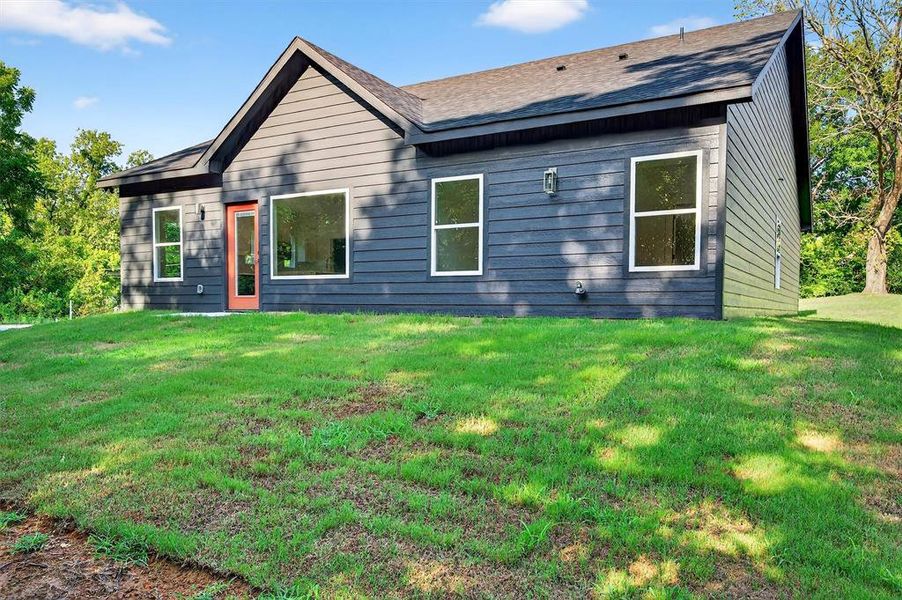 Front exterior of a new home in , Denison, TX, highlighting curb appeal (Image 18). Front exterior of a new home in , Denison, TX, highlighting curb appeal (Image 18).