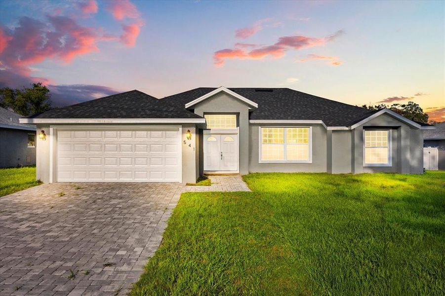 Front exterior of a new home in , Deland, FL, highlighting curb appeal (Image 14).