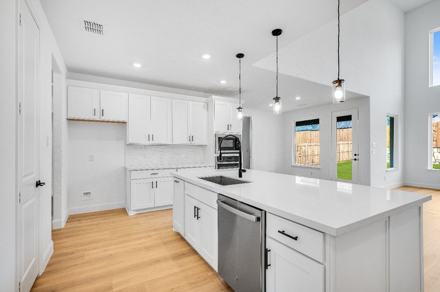 Representative furnished interior of a home built from the Sapphire by Taylor Morrison in Highland Lakes 60s, McKinney (Image 4).