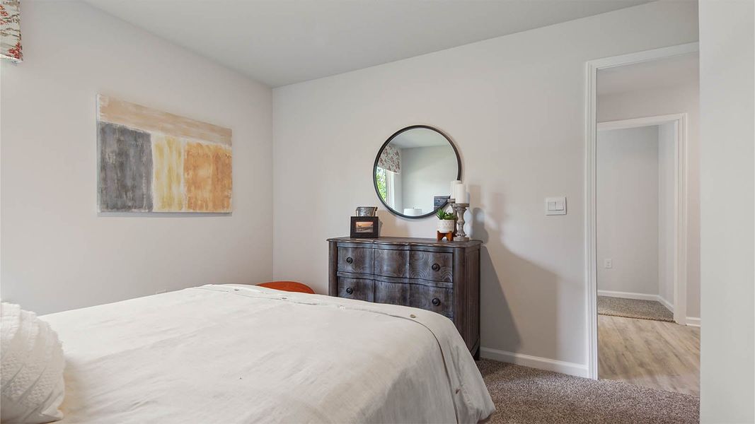 Representative furnished interior of a home built from the Cali by D.R. Horton in Owl's Head East, Freeport (Image 28).