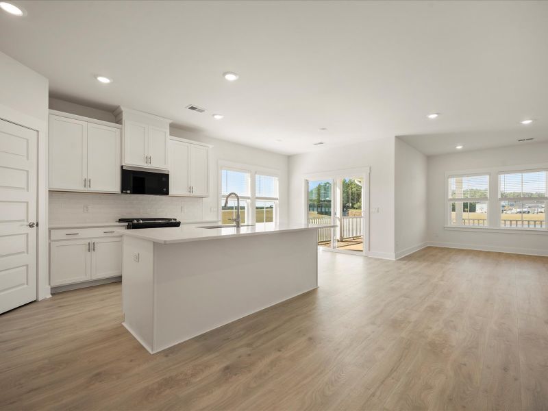Furnished interior view inside a new home in The Coves at Lakes of Cane Bay, Summerville (Image 9).