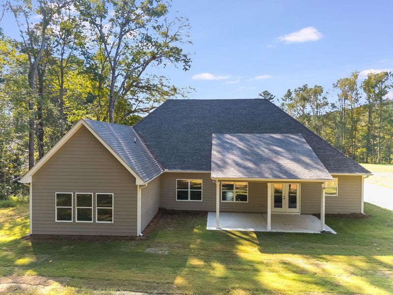 Front exterior of a new home in LOVVORN ESTATES, Carrollton, GA, highlighting curb appeal (Image 26).