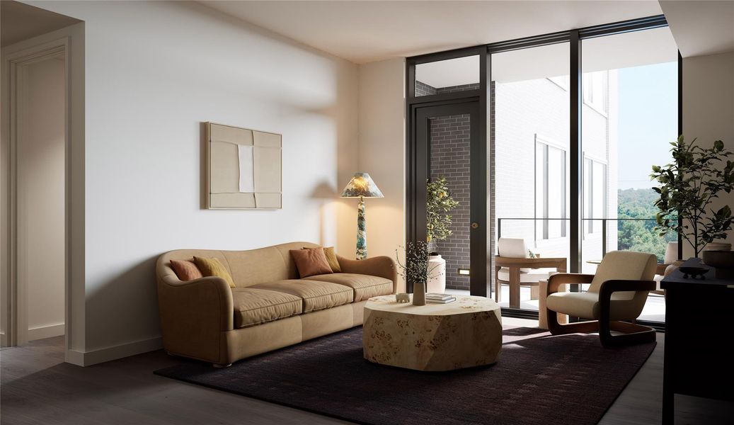 Living area featuring floor-to-ceiling windows with views overlooking Old West Austin. Includes wood flooring, abundant natural light, and direct access to the private balcony.