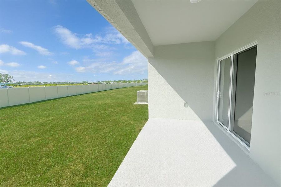 Exterior details and patio area of a home in Broadleaf, Parrish (Image 3). Exterior details and patio area of a home in Broadleaf, Parrish (Image 3).