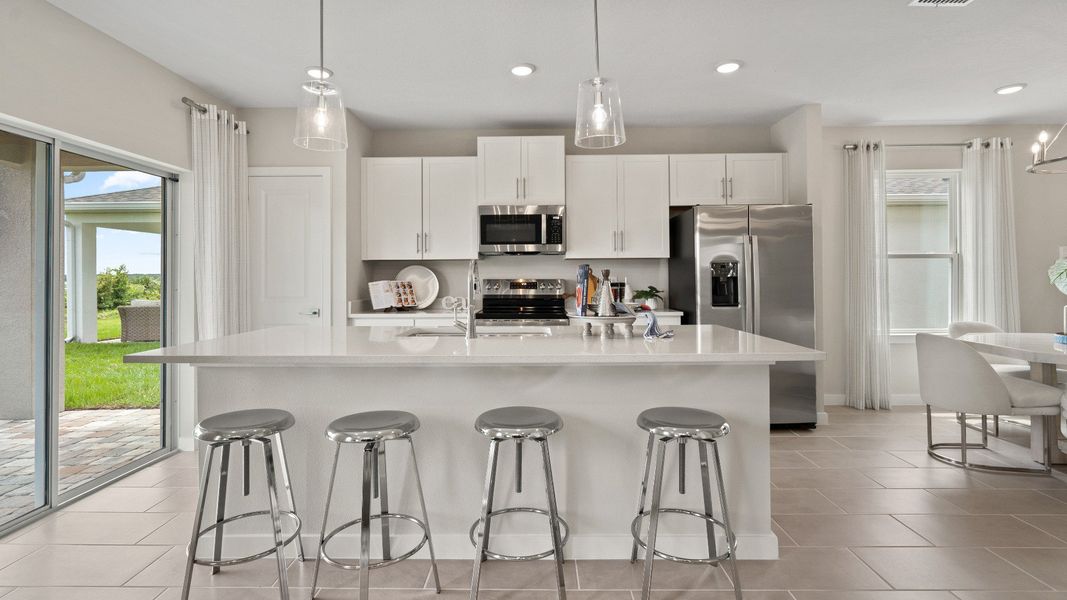 Kitchen in Ponte Vedra New Home Plan in Hamilton Bluff in Haines City, FL by DRB Homes