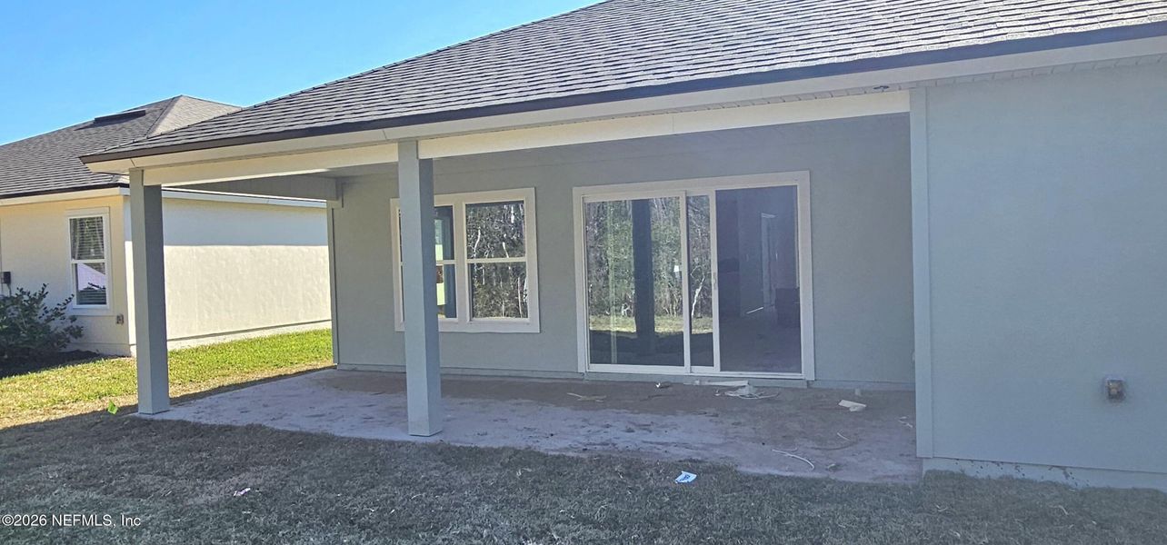 Exterior details and patio area of a home in Sawmill Branch, Palm Coast (Image 24). Exterior details and patio area of a home in Sawmill Branch, Palm Coast (Image 24).