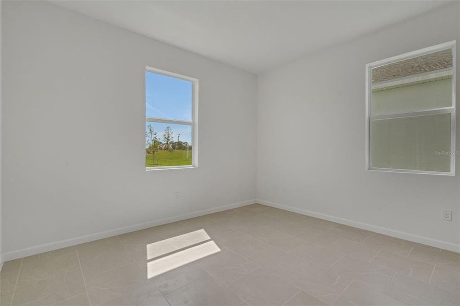 Spacious, unfurnished interior of a new home in Brystol North at Wylder, Port St. Lucie (Image 13).