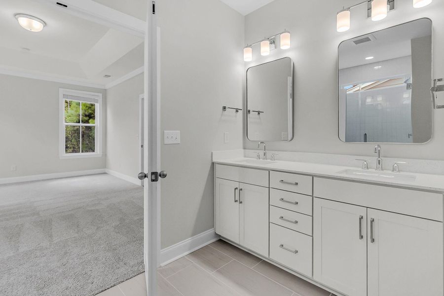 Furnished interior view inside a new home in Tidewater at Lakes of Cane Bay, Summerville (Image 8).