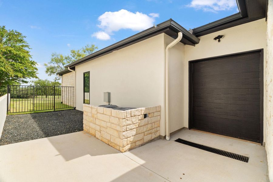 Side of home golf cart entrance Side of home golf cart entrance