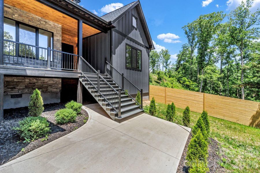 Front exterior of a new home in , Fairview, NC, highlighting curb appeal (Image 27).